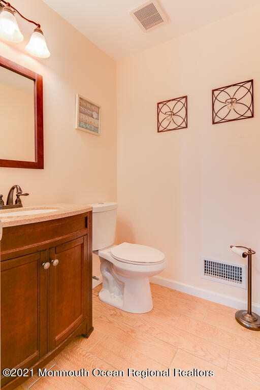 7 Queen Ann Road Brick, NJ 08723 - Photo 23 of 52 Half bath on main floor