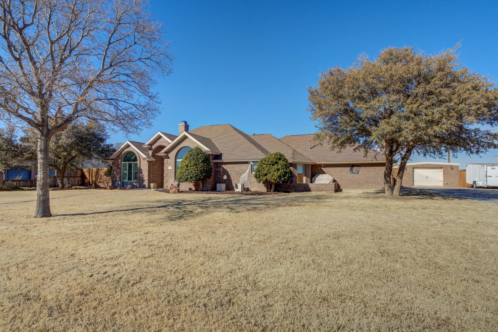 6302 County Road 7435 Lubbock, TX 79424 - Photo 2 of 59 a house view with a outdoor space