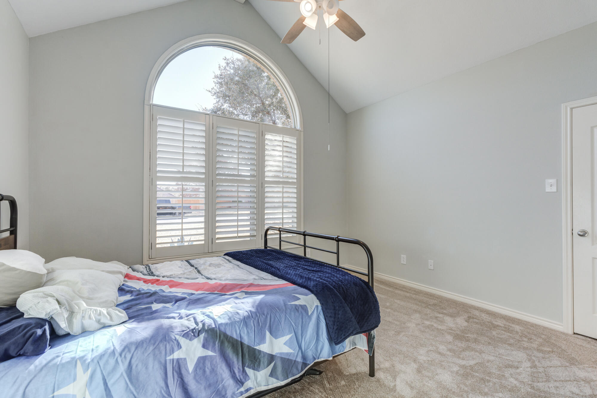 6302 County Road 7435 Lubbock, TX 79424 - Photo 26 of 59 a bedroom with a bed and a window