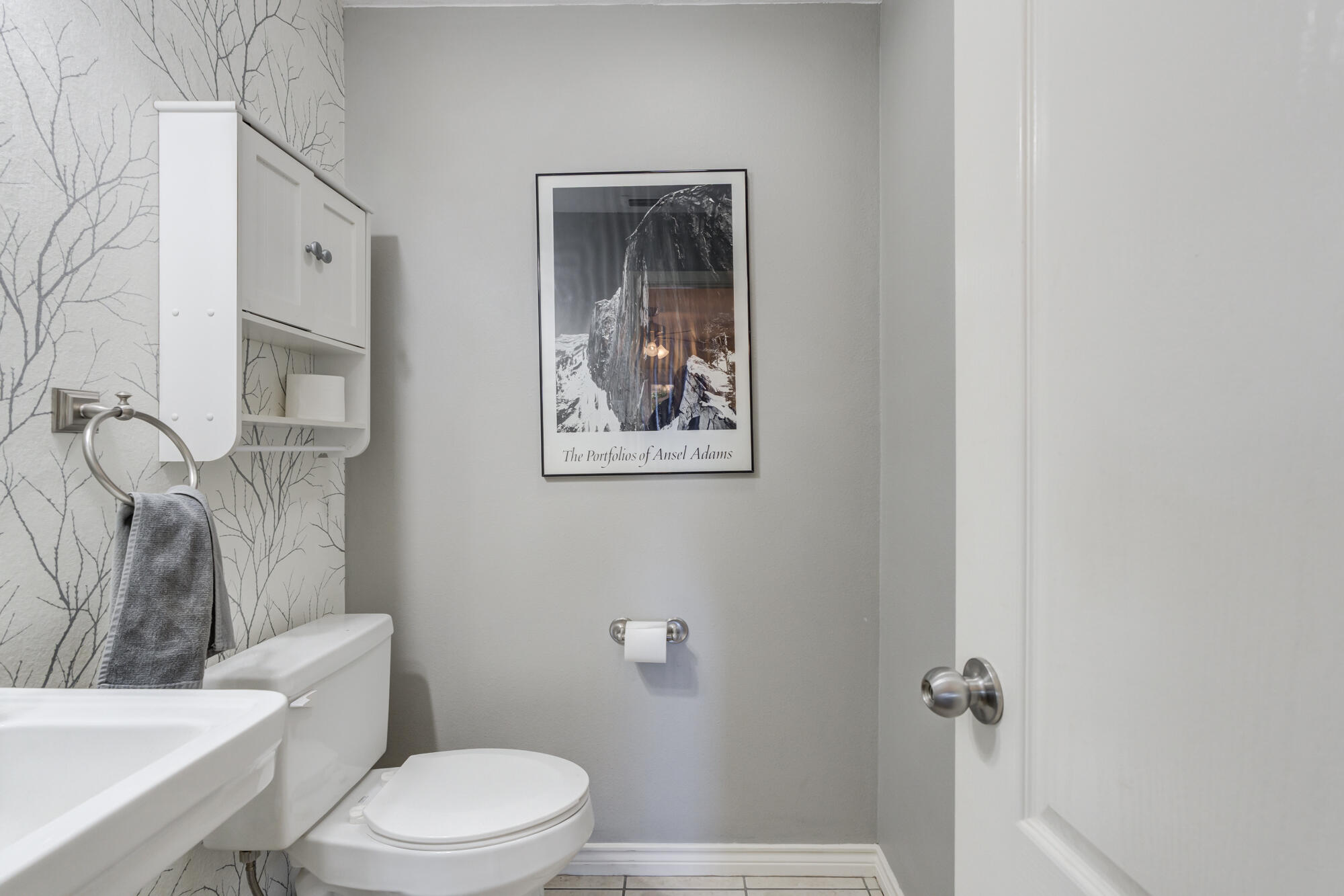 6302 County Road 7435 Lubbock, TX 79424 - Photo 44 of 59 a white toilet sitting next to a bathroom sink and tub