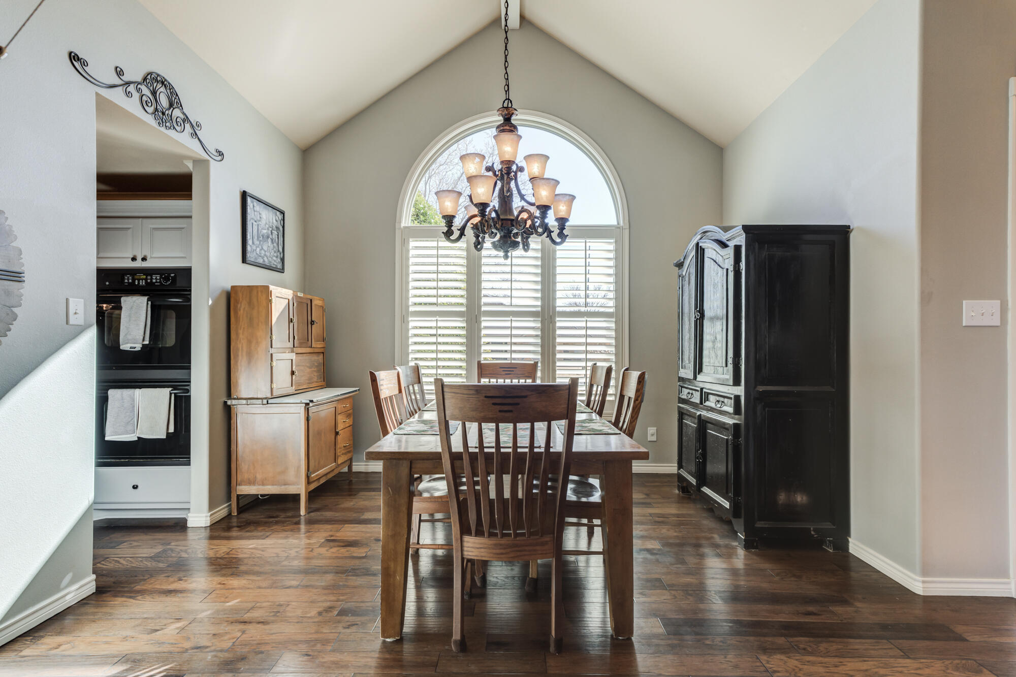 6302 County Road 7435 Lubbock, TX 79424 - Photo 6 of 59 a view of a dining room with furniture window and wooden floor