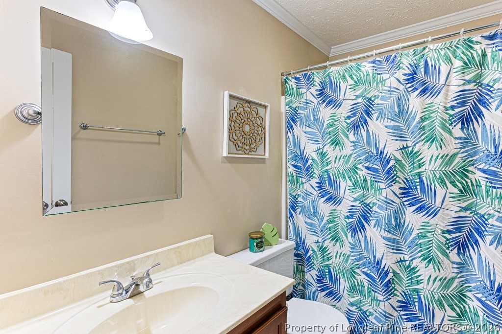 461 Lands End Road Fayetteville, NC 28314 - Photo 17 of 31 a bathroom with a sink and a mirror