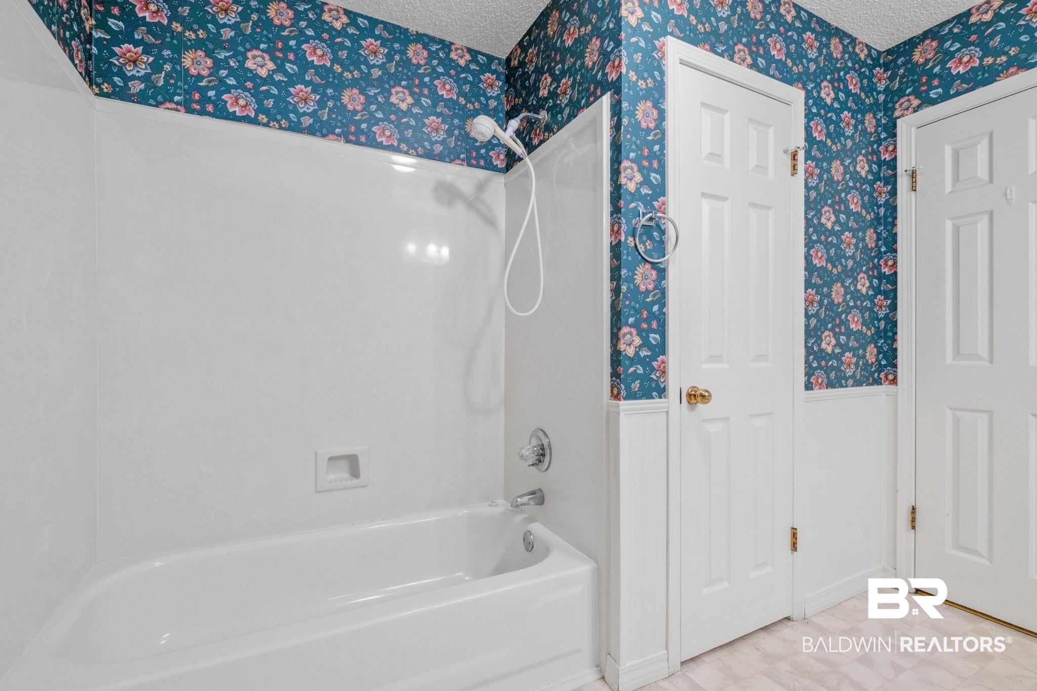 1340 Wellsley Court Mobile, AL 36695 - Photo 24 of 37 Full bathroom with bathtub / shower combination, a wainscoted wall, wallpapered walls, and a textured ceiling