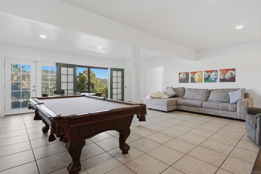 3328 Central Avenue Spring Valley, CA 91977 - Photo 17 of 54 a living room with furniture a rug and a large window