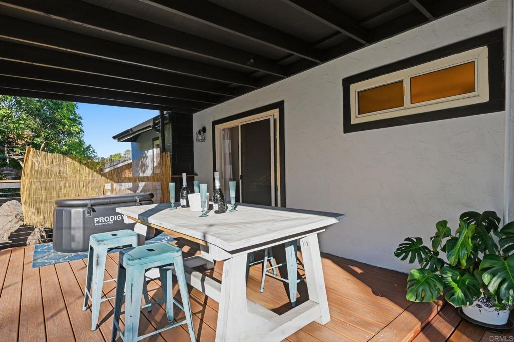 3328 Central Avenue Spring Valley, CA 91977 - Photo 32 of 54 a view of a dinning table and chairs in patio
