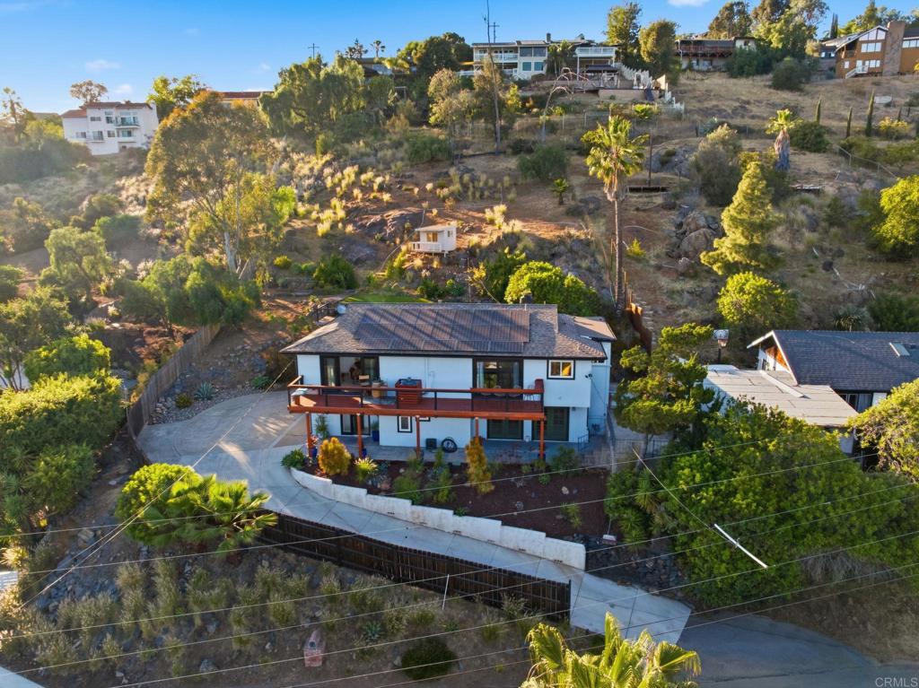 3328 Central Avenue Spring Valley, CA 91977 - Photo 51 of 54 an aerial view of a house with swimming pool and a yard