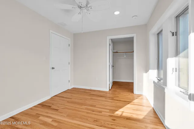 a view of an empty room with a fireplace