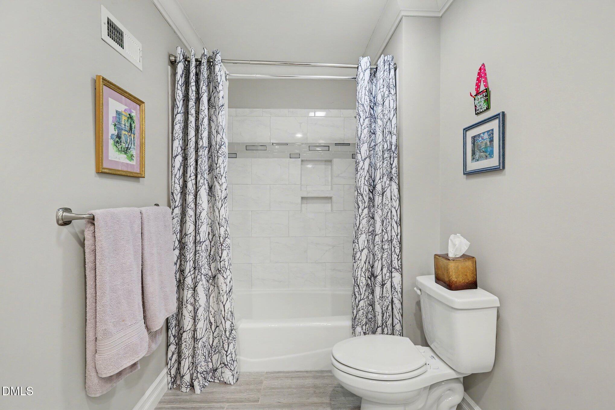 8824 Wildwood Links Raleigh, NC 27613 - Photo 34 of 53 034_file_7680