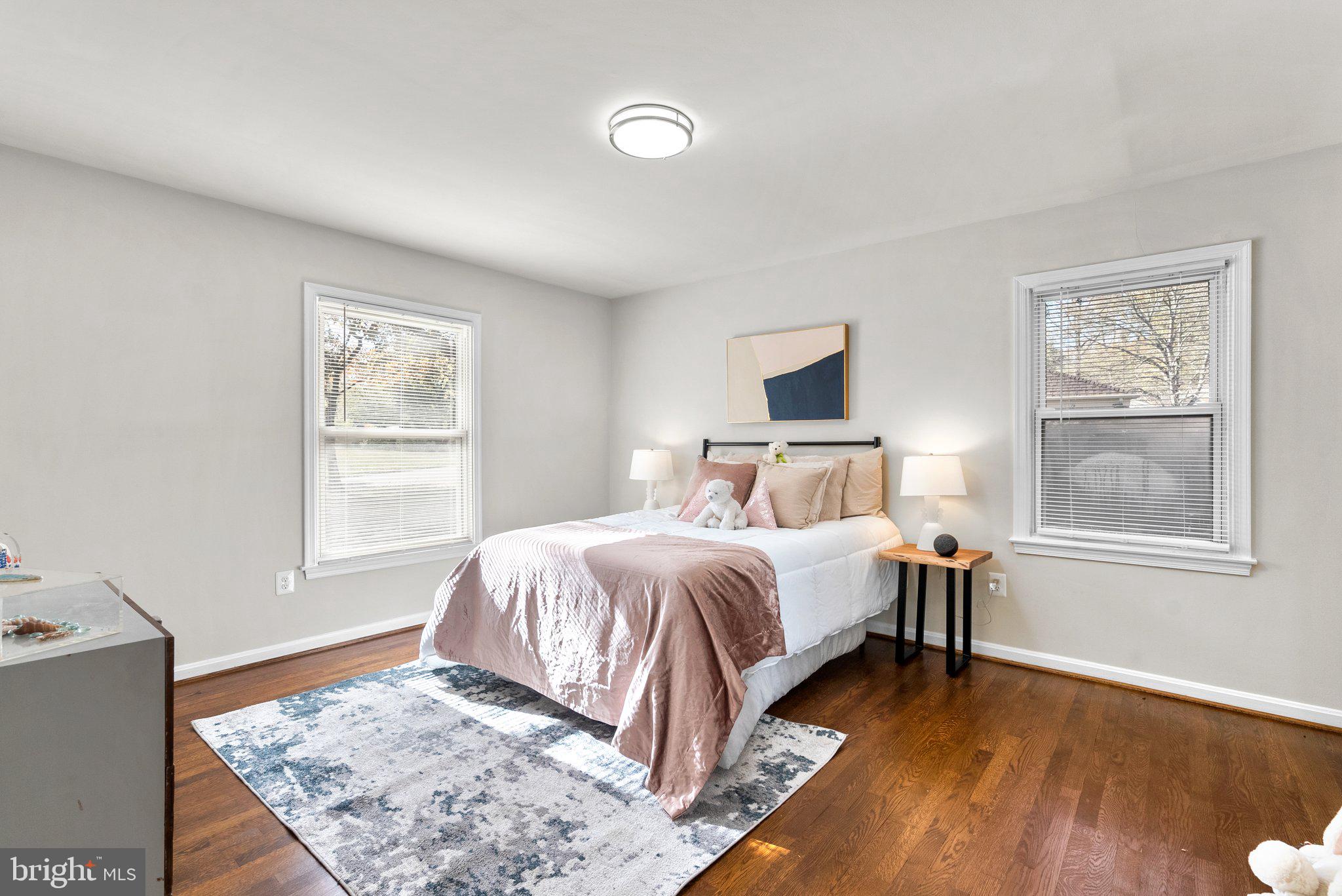225 Hermleigh Road Silver Spring, MD 20902 - Photo 14 of 29 a bedroom with a bed and a window