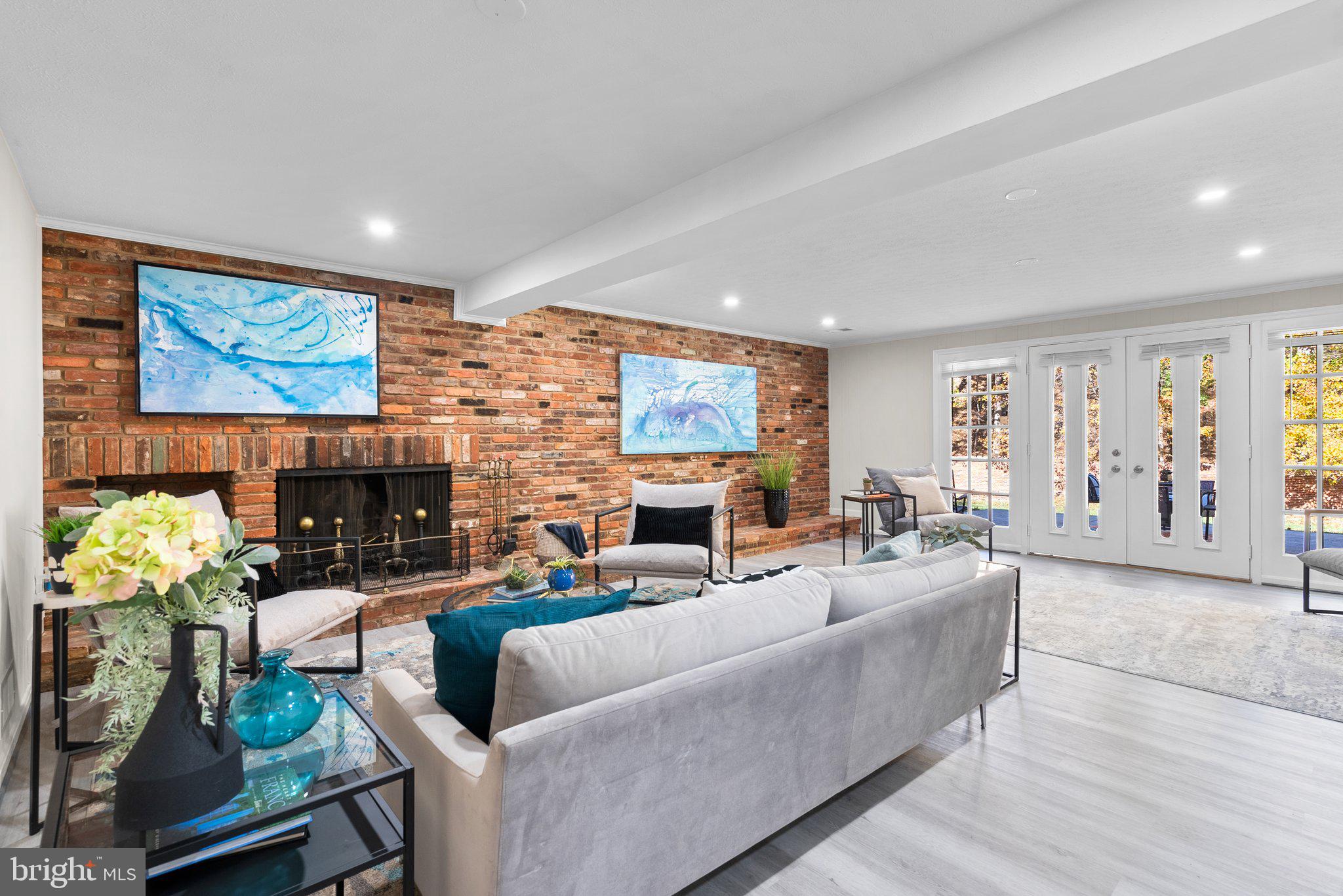 225 Hermleigh Road Silver Spring, MD 20902 - Photo 17 of 29 a living room with fireplace furniture and a large window