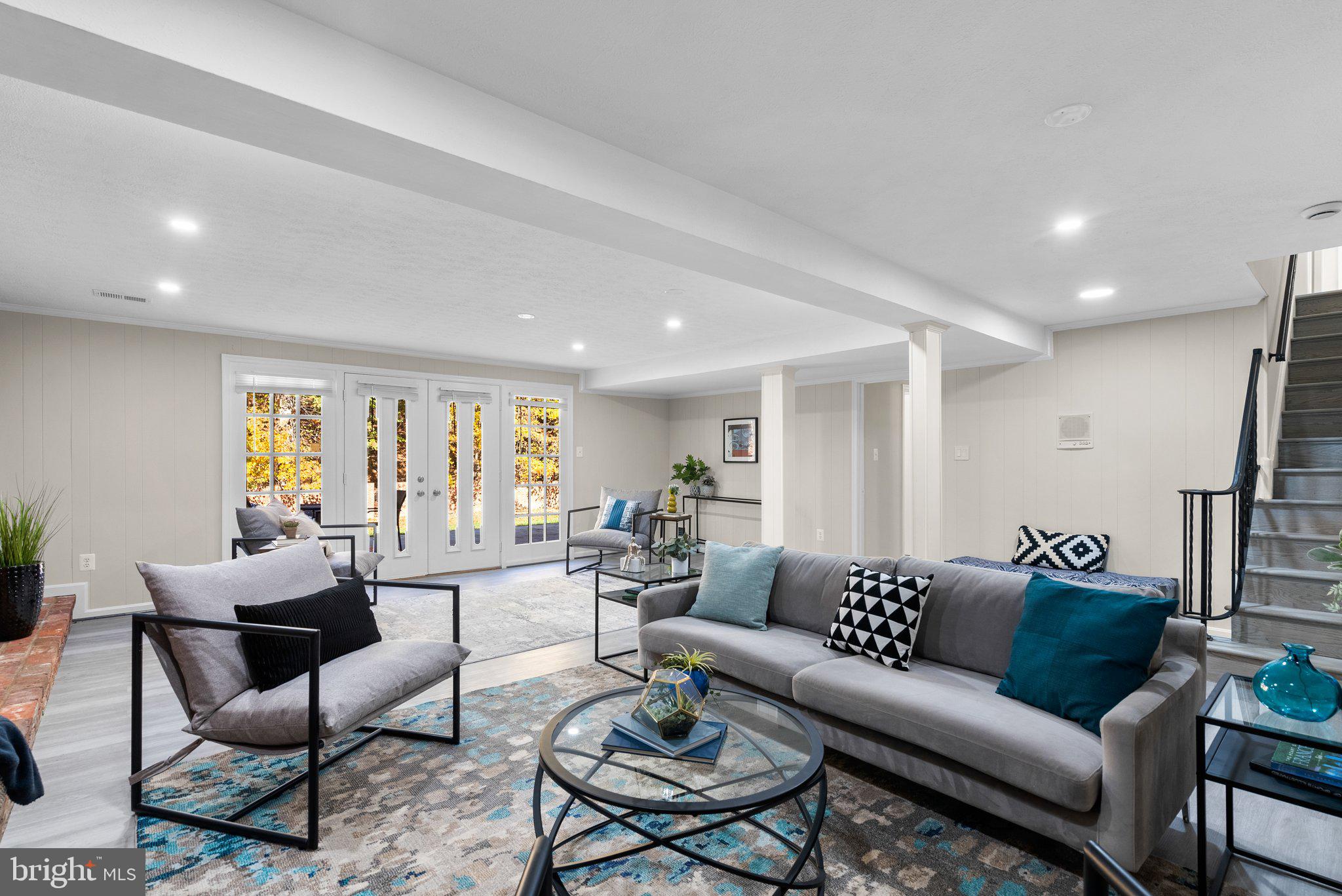 225 Hermleigh Road Silver Spring, MD 20902 - Photo 18 of 29 a living room with furniture and a large window