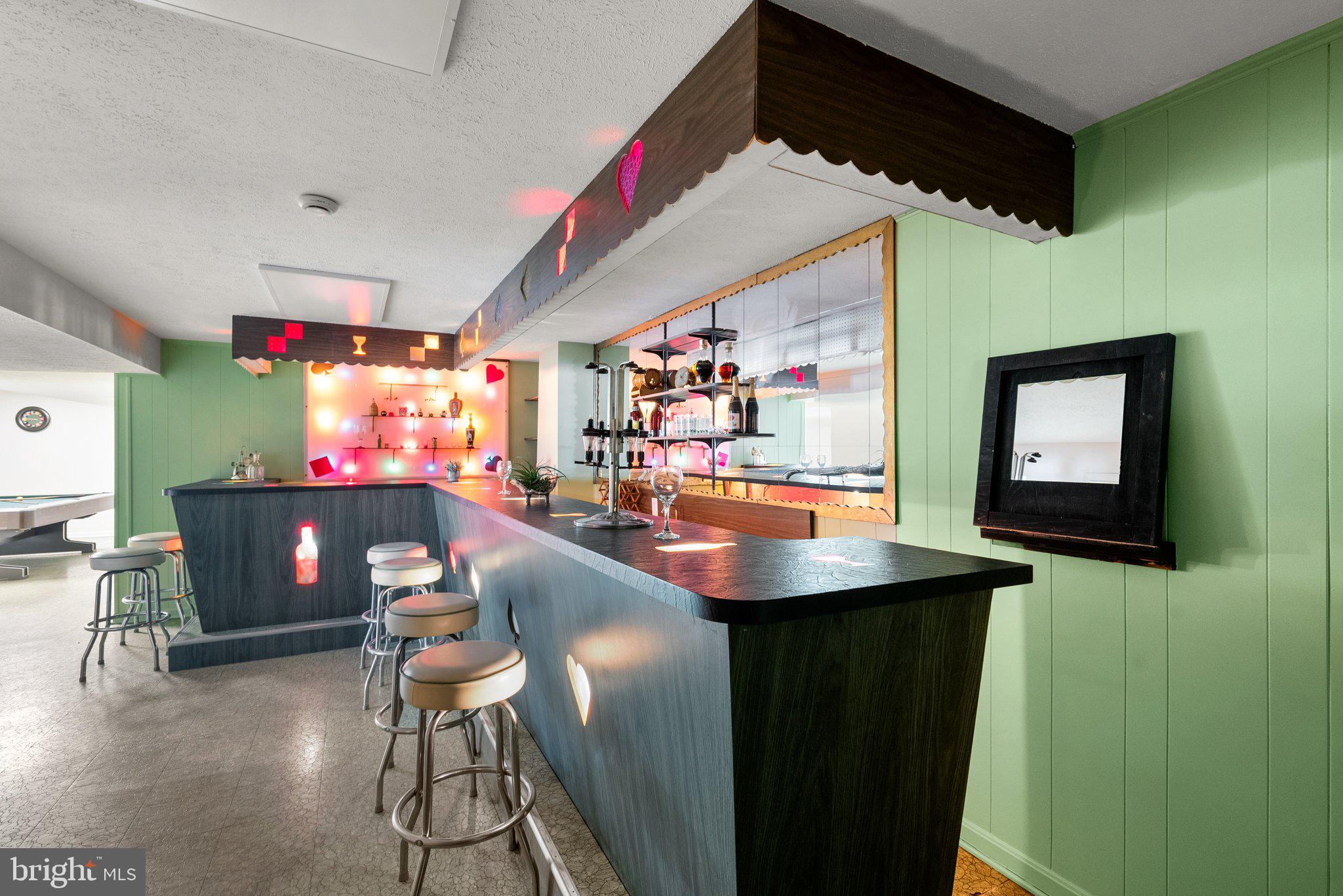 225 Hermleigh Road Silver Spring, MD 20902 - Photo 21 of 29 a room with table chairs and white walls