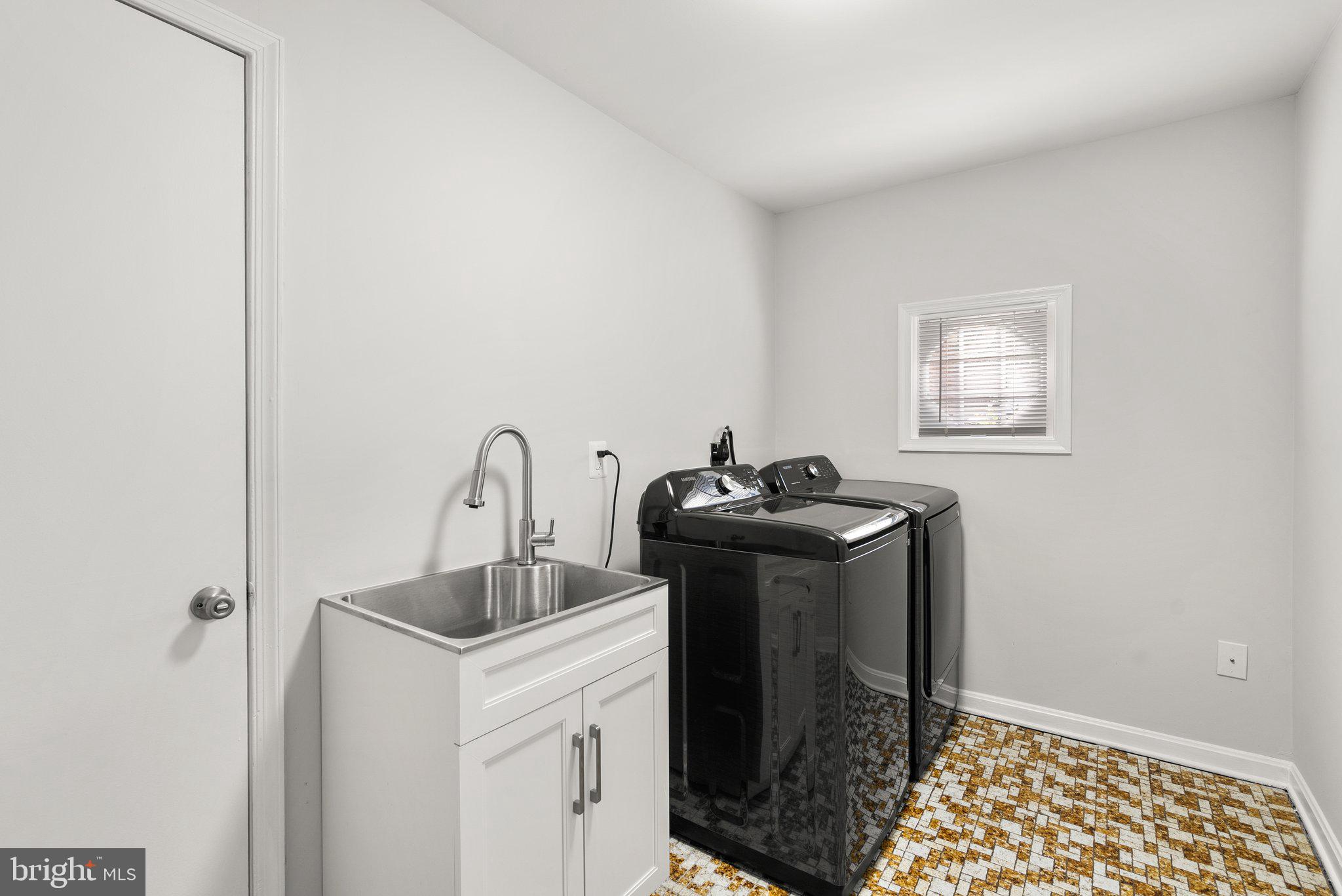 225 Hermleigh Road Silver Spring, MD 20902 - Photo 24 of 29 a utility room with dryer and washer