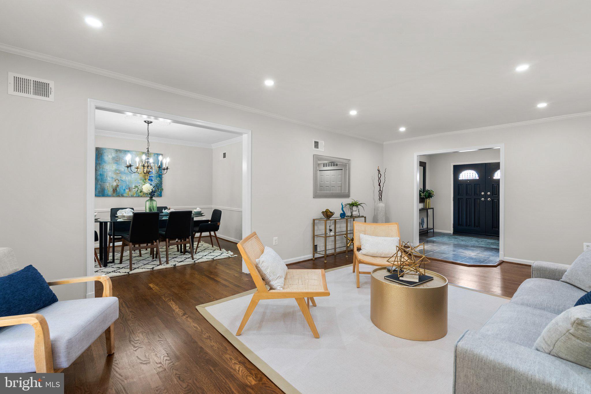 225 Hermleigh Road Silver Spring, MD 20902 - Photo 6 of 29 a living room with furniture a dining table and a potted plant