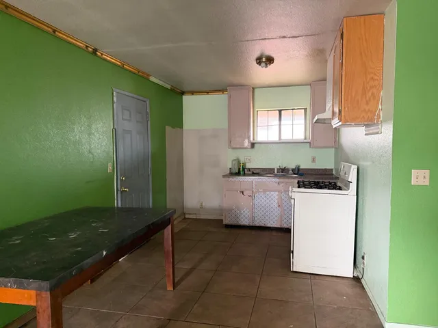 a bathroom with a shower and a toilet