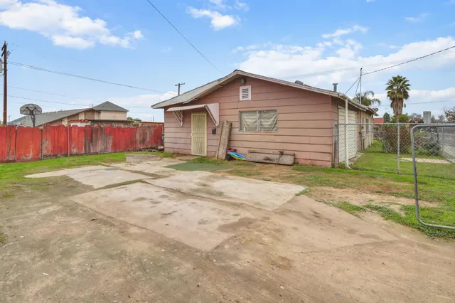 a view of backyard of house