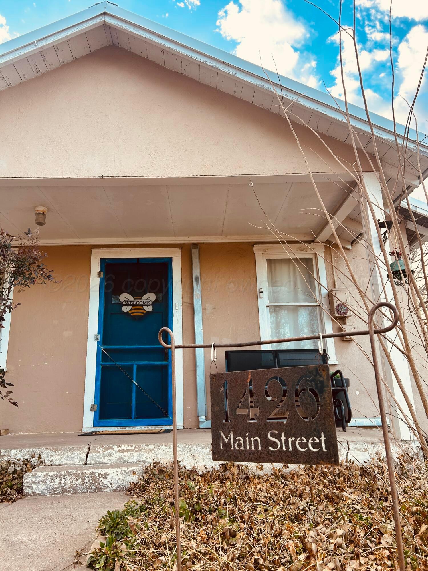 1426 South Main Street Canadian, TX 79014 - Photo 1 of 26 a front view of a house with a yard