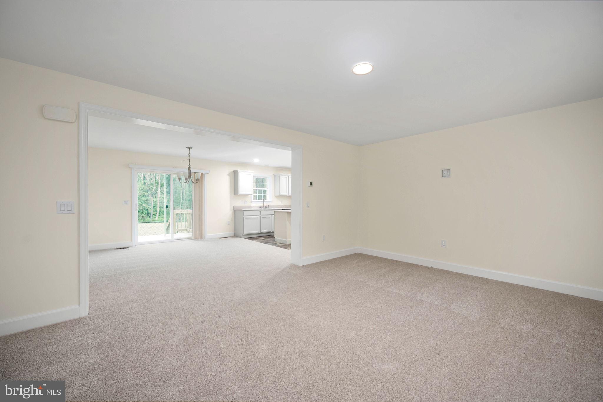 300 River Oaks Road Center Cross, VA 22437 - Photo 11 of 39 a view of an empty room with a window