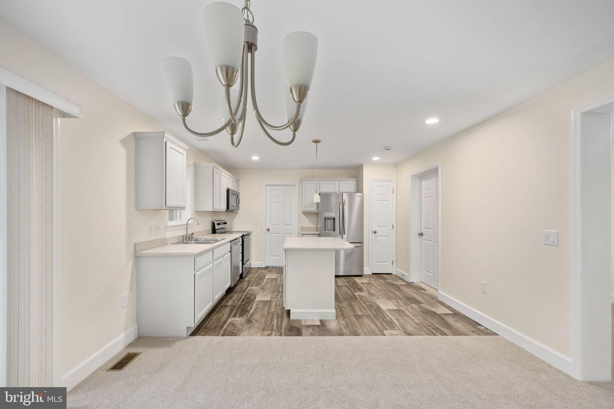 300 River Oaks Road Center Cross, VA 22437 - Photo 15 of 39 Modern kitchen with elegant finishes.