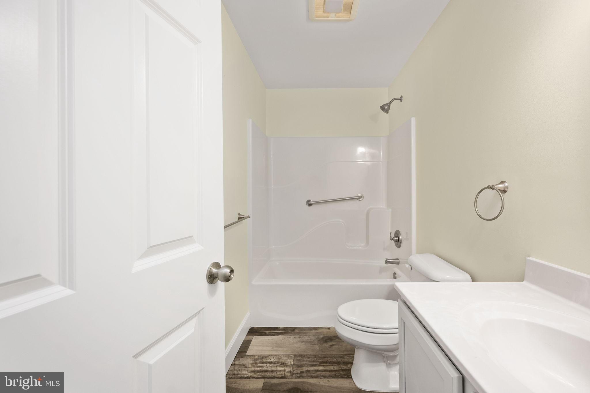 300 River Oaks Road Center Cross, VA 22437 - Photo 33 of 39 a bathroom with a sink toilet and shower