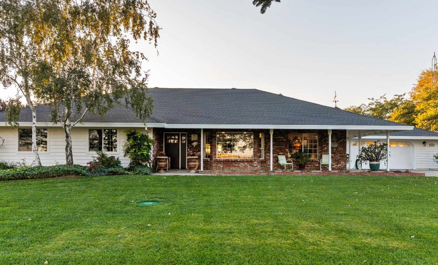 11875 Reclamation Road Meridian, CA 95957 - Photo 1 of 1 a view of a house with a yard and sitting area