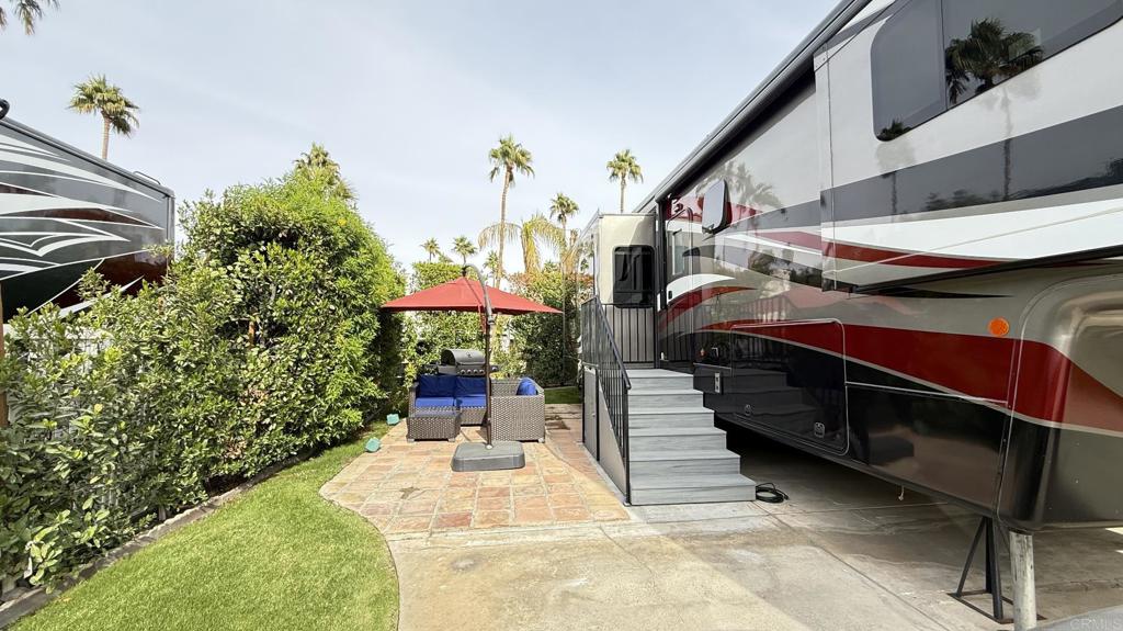 69411 Ramon Road, Unit 91 Cathedral City, CA 92234 - Photo 4 of 9 a view of an outdoor space with porch