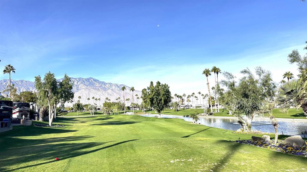 69411 Ramon Road, Unit 91 Cathedral City, CA 92234 - Photo 8 of 9 a view of a playground with basketball court