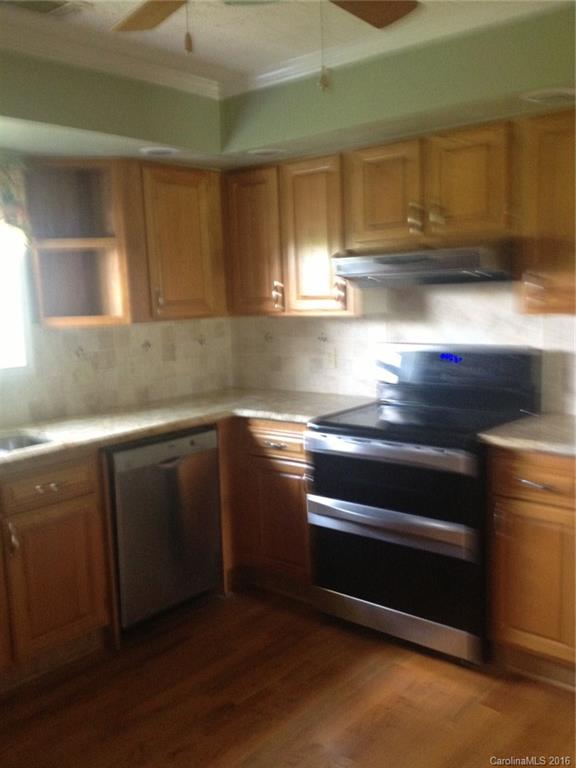1032 Snyders Store Road, Unit 5 Wingate, NC 28174 - Photo 2 of 7 a close view of cabinet