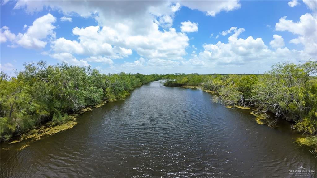0 East Fernando East Road Rio Hondo, TX 78583 - Photo 1 of 8 a view of a lake with houses