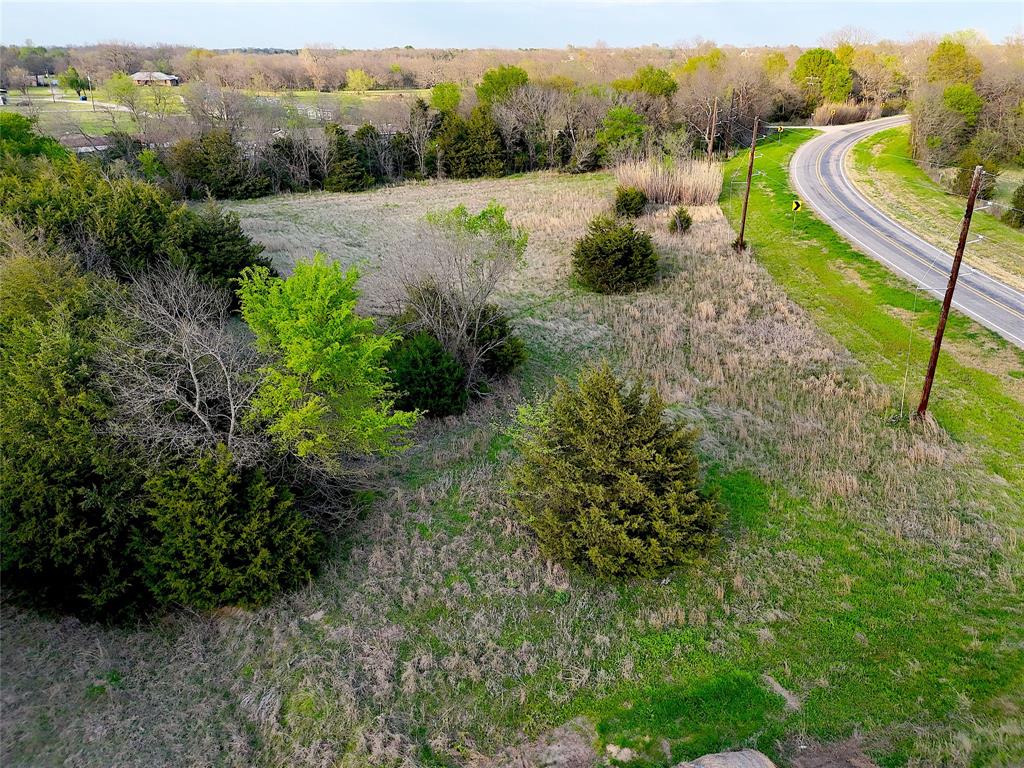 25 Fm 2194 Celeste, TX 75423 - Photo 11 of 13 a view of a street with a houses