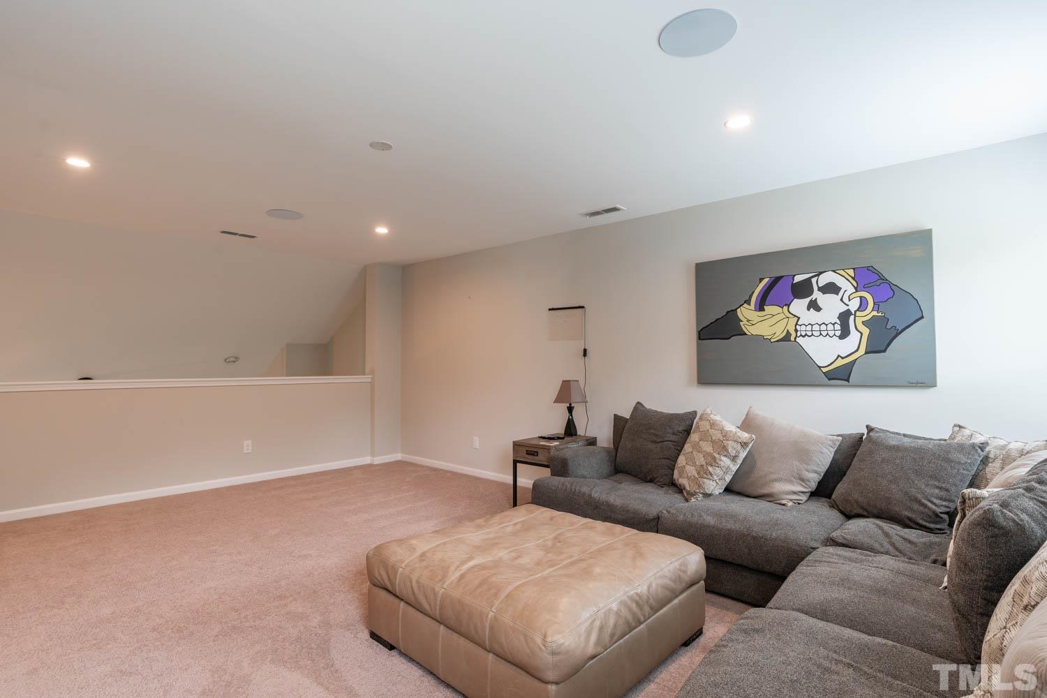 3565 Massey Ridge Court Raleigh, NC 27616 - Photo 17 of 22 a living room with furniture and a couch