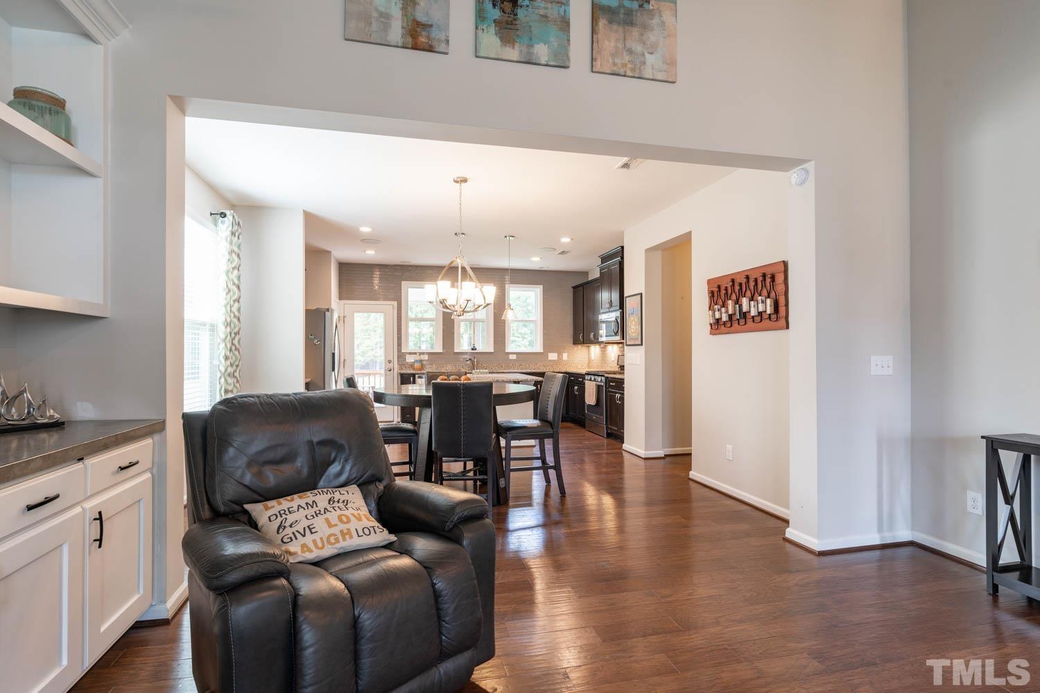 3565 Massey Ridge Court Raleigh, NC 27616 - Photo 8 of 22 a living room with furniture and wooden floor