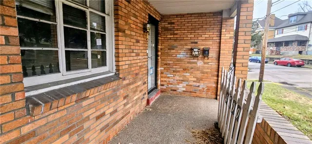 a view of a balcony with a large window