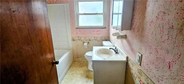 a bathroom with a sink and a tub