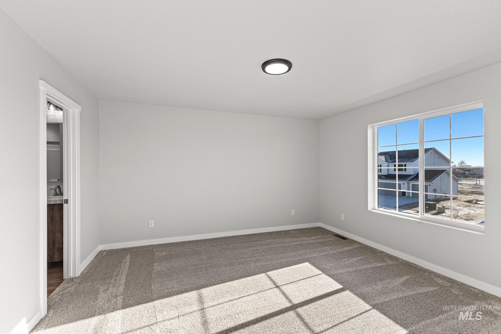 1436 Long Pond Street Middleton, ID 83644 - Photo 19 of 24 Unfurnished bedroom featuring carpet