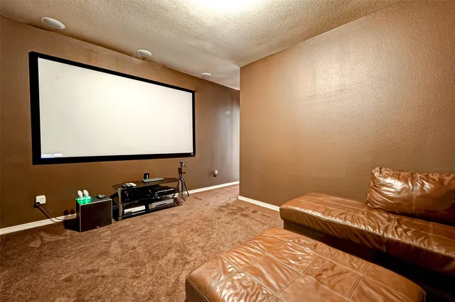 a bedroom with bed and window