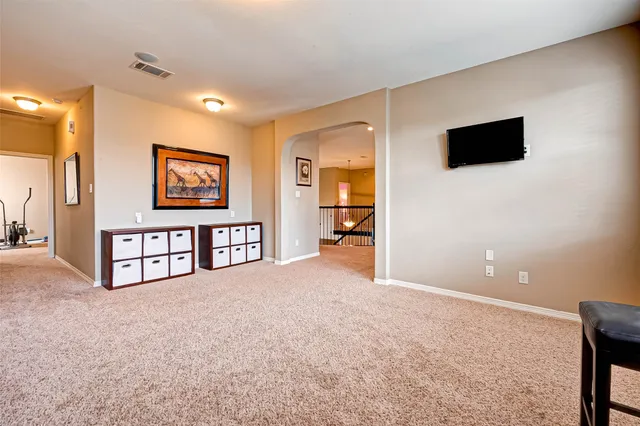 a view of a livingroom with a flat screen tv