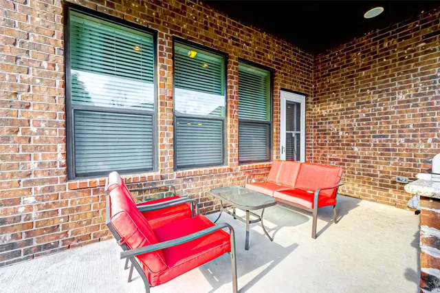 a building outdoor space with patio furniture