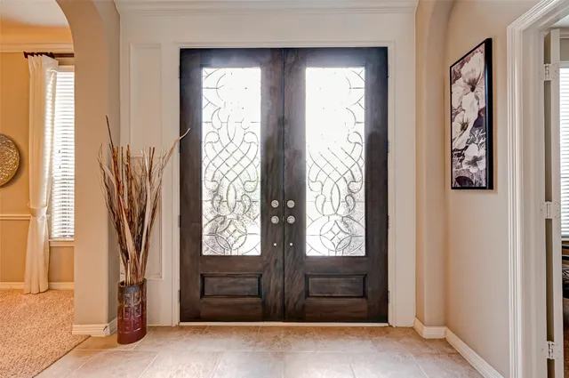 a view of an entryway with a door