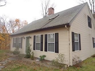 7 Ware Road Killingly, CT 06241 - Photo 1 of 1 a front view of a house with a yard