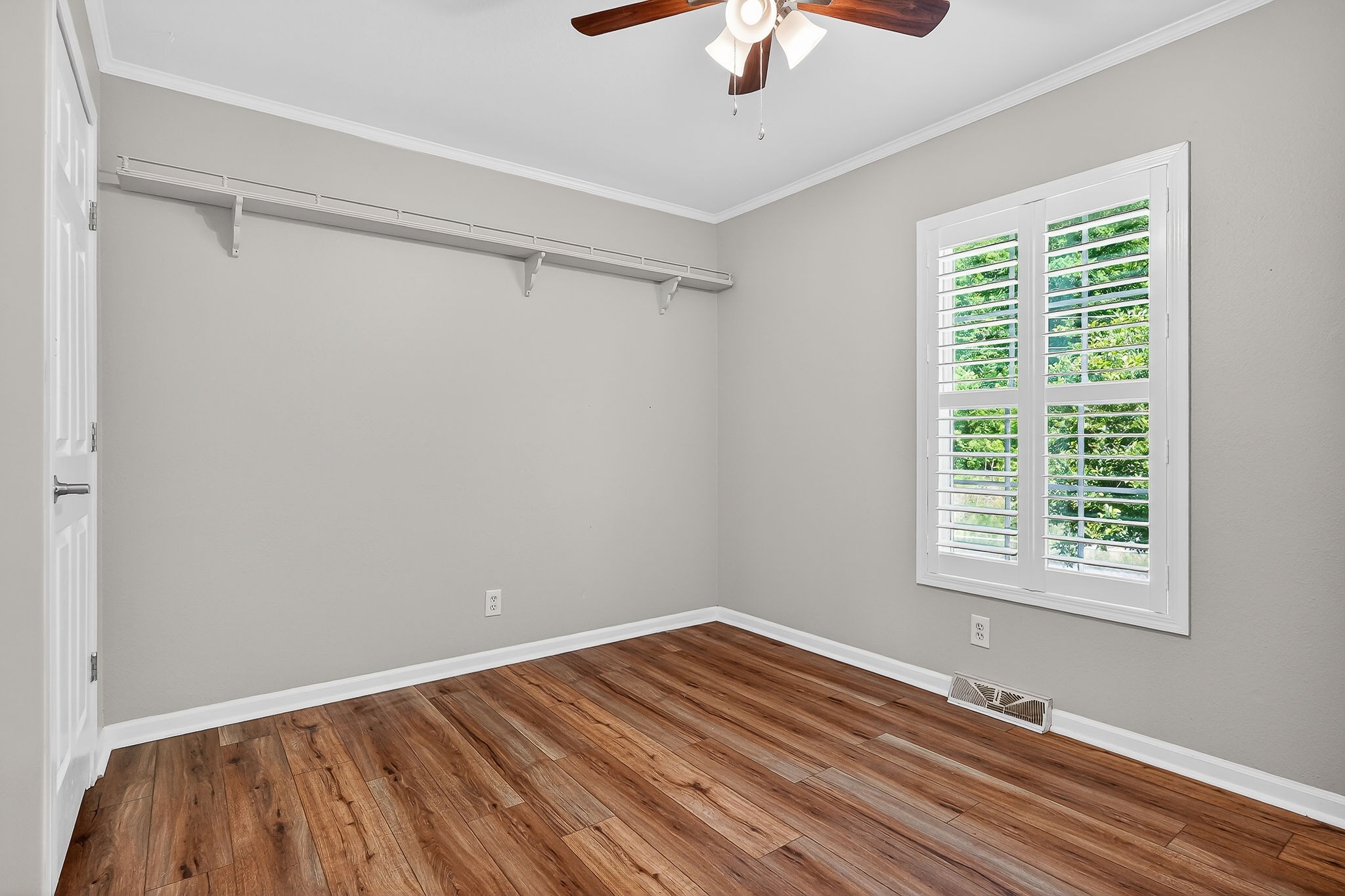 16130 Buffalo Valley Road Silver Point, TN 38582 - Photo 40 of 47 a view of empty room with wooden floor and fan