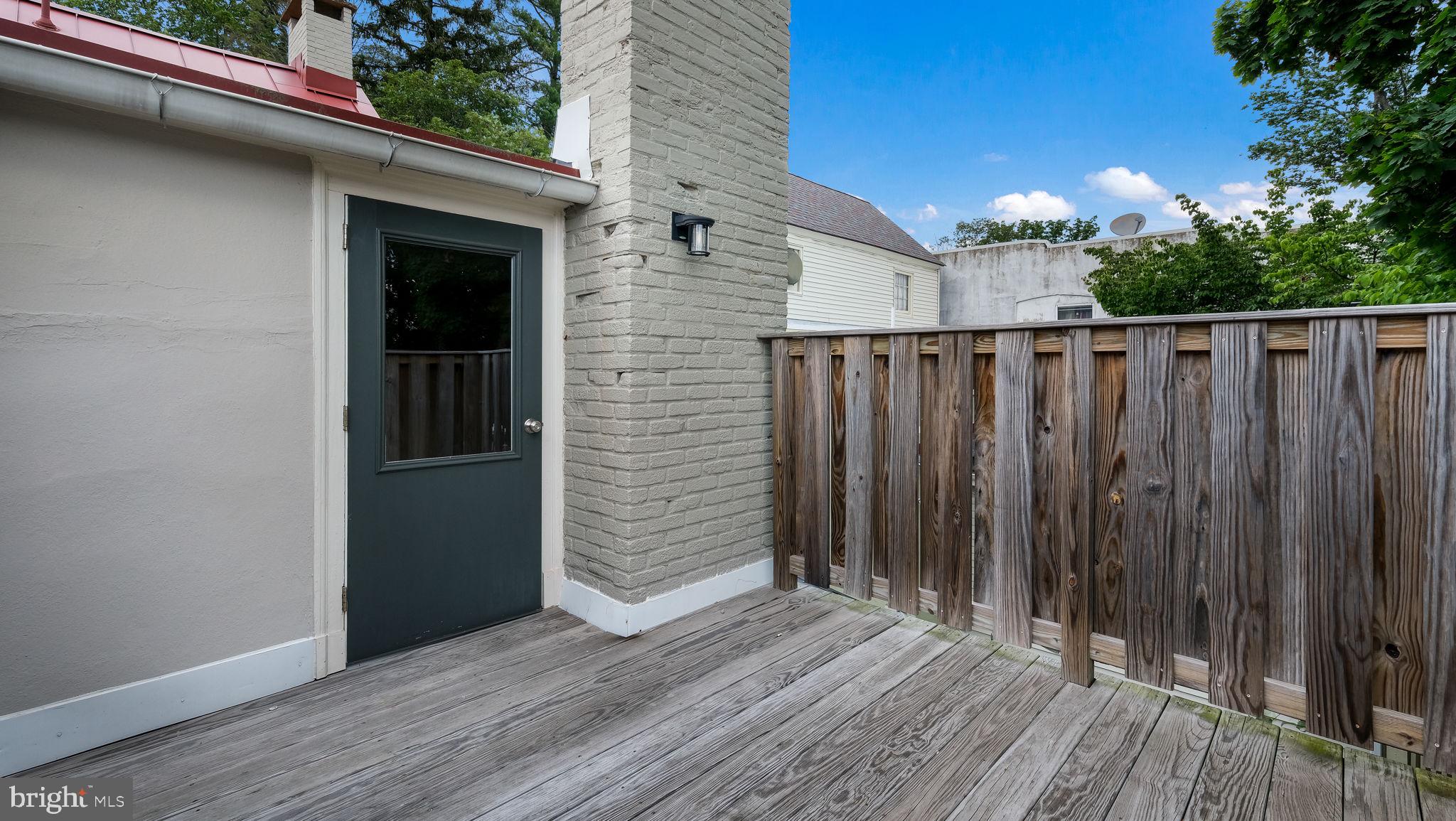 112 East State Street, Unit 6 Doylestown, PA 18901 - Photo 7 of 17 a view of front door and deck