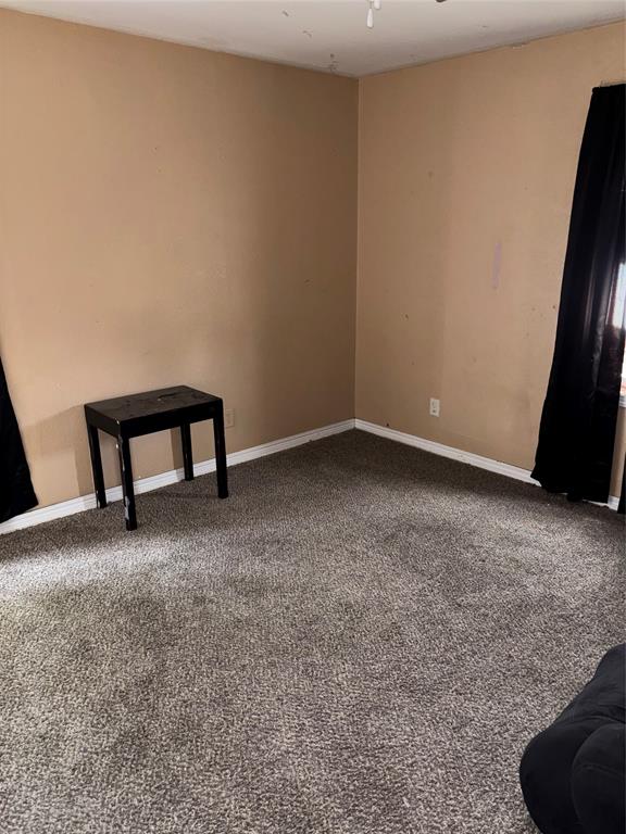 105 Philview Street Borger, TX 79007 - Photo 4 of 7 a view of an empty room and room with a window