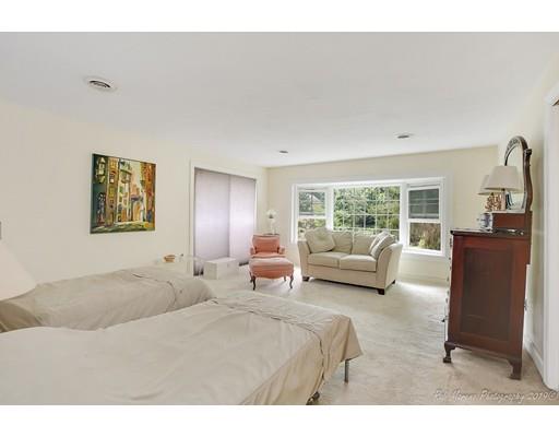 20 Cutler Road Hamilton, MA 01982 - Photo 15 of 23 a bedroom with a large bed and a couch