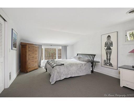 20 Cutler Road Hamilton, MA 01982 - Photo 17 of 23 a spacious bedroom with a bed and a window
