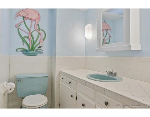 20 Cutler Road Hamilton, MA 01982 - Photo 19 of 23 a bathroom with a toilet a sink and mirror