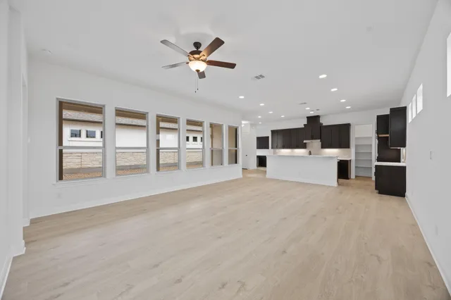 a view of a kitchen with a sink cabinets and window