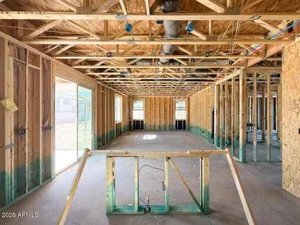 a view of a hall with wooden floor