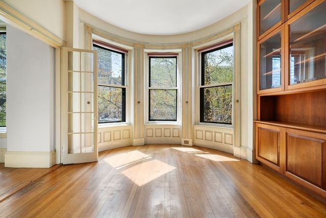 a view of a kitchen with furniture and window