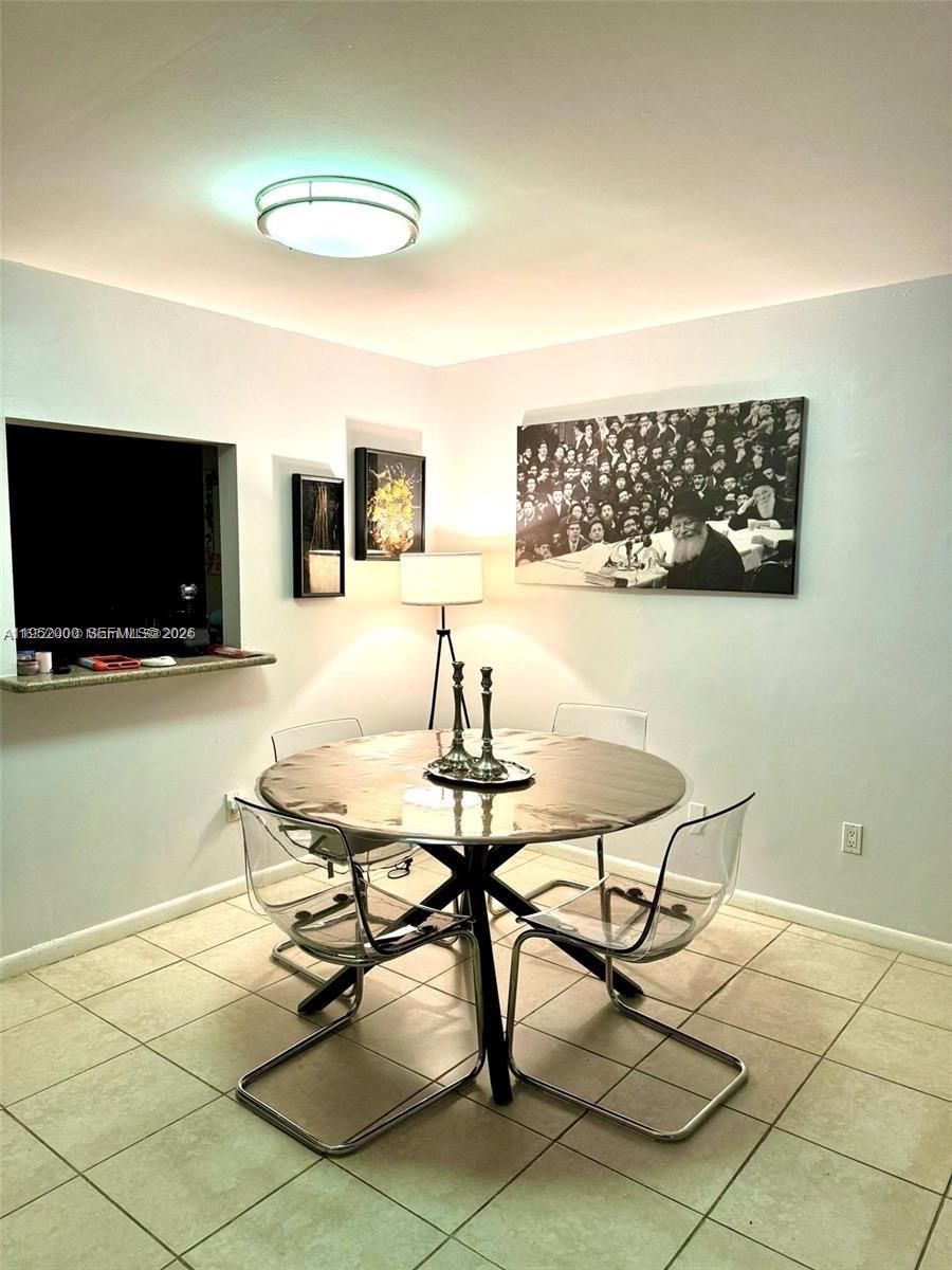 4111 Stirling Road, Unit 308 Fort Lauderdale, FL 33314 - Photo 11 of 32 a view of a livingroom with furniture
